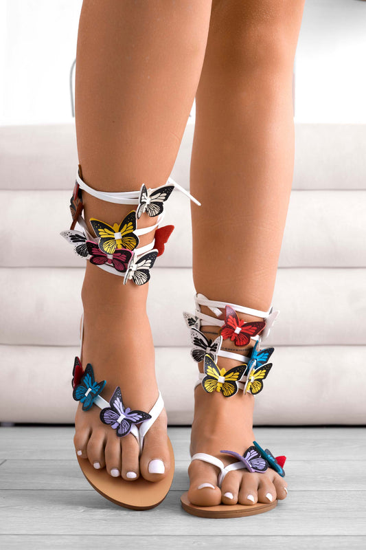 Sandali infradito bassi bianchi con applicazioni farfalle