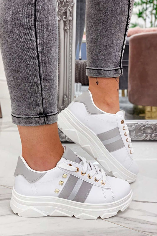 White sneakers with studs and silver inserts