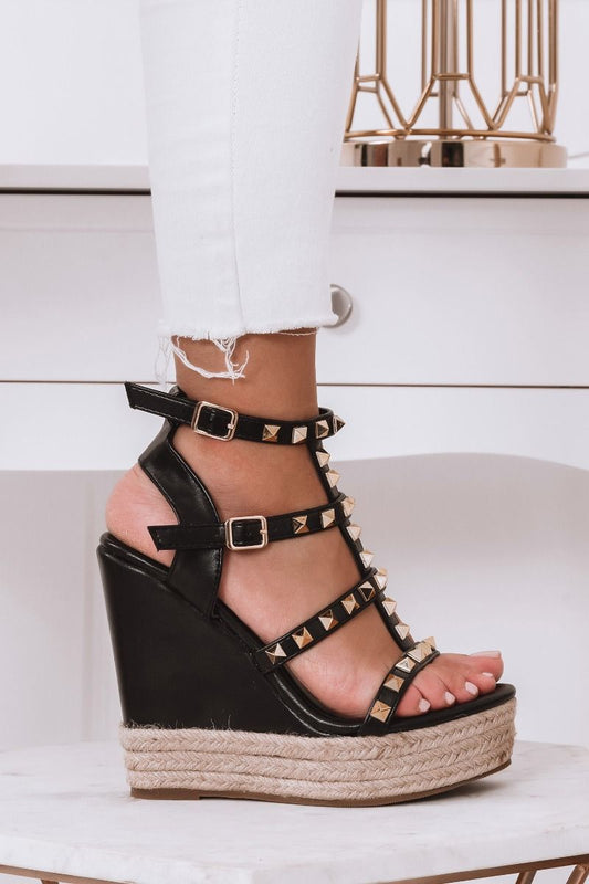 Black wedge sandals with laces and gold studs
