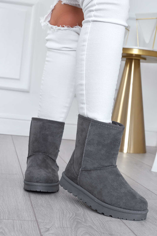 Botines grises acolchados y cálidos