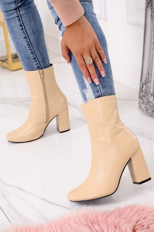 Beige python ankle boots with comfortable heel