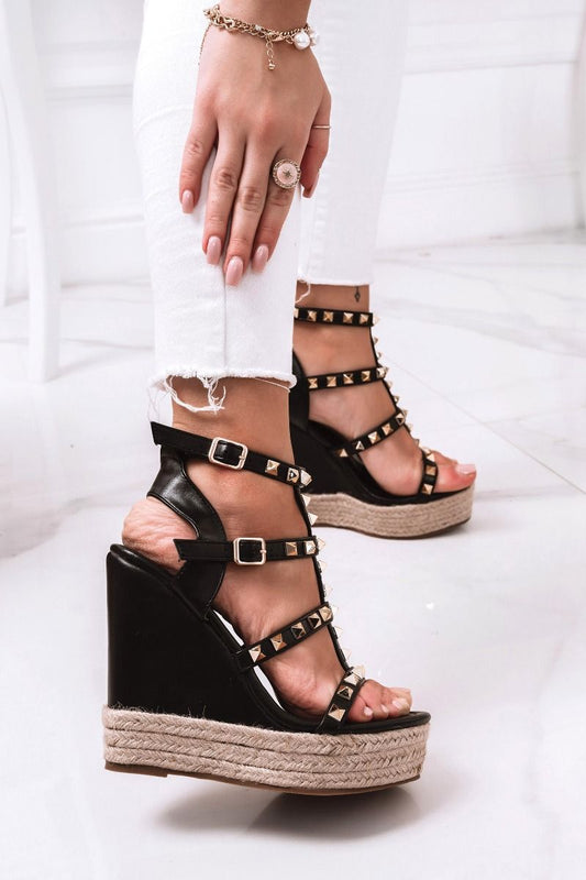 Black wedge sandals with laces and gold studs