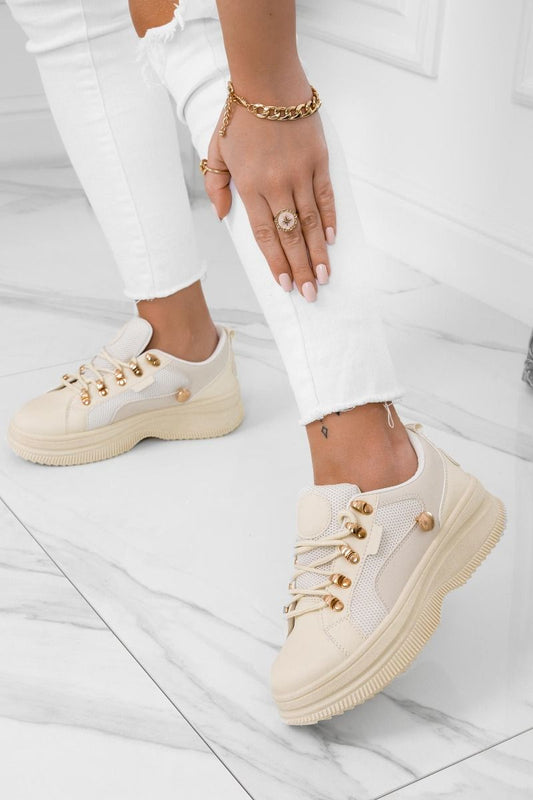 Beige sneakers with button and gold hooks