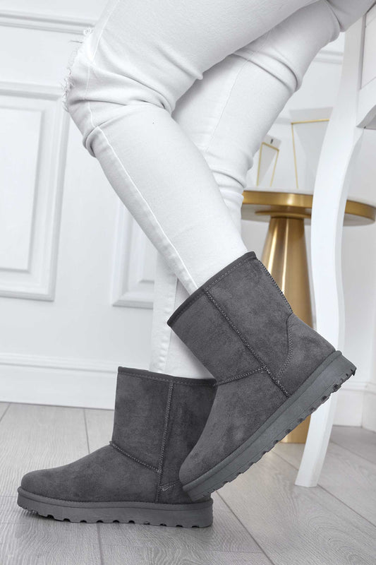 Botines grises acolchados y cálidos