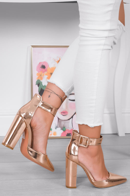Rose gold patent leather pumps with strap and comfortable heel