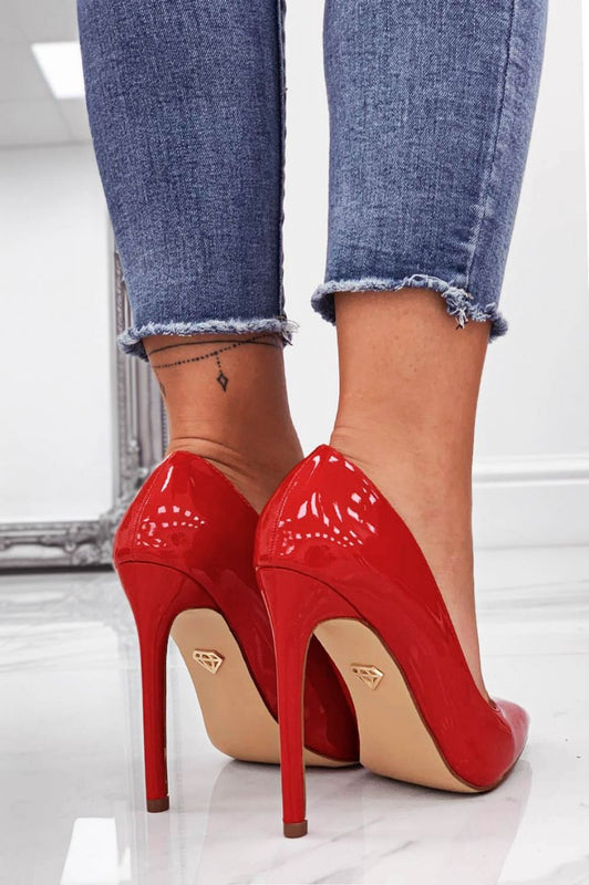 Red patent leather pumps with high heel