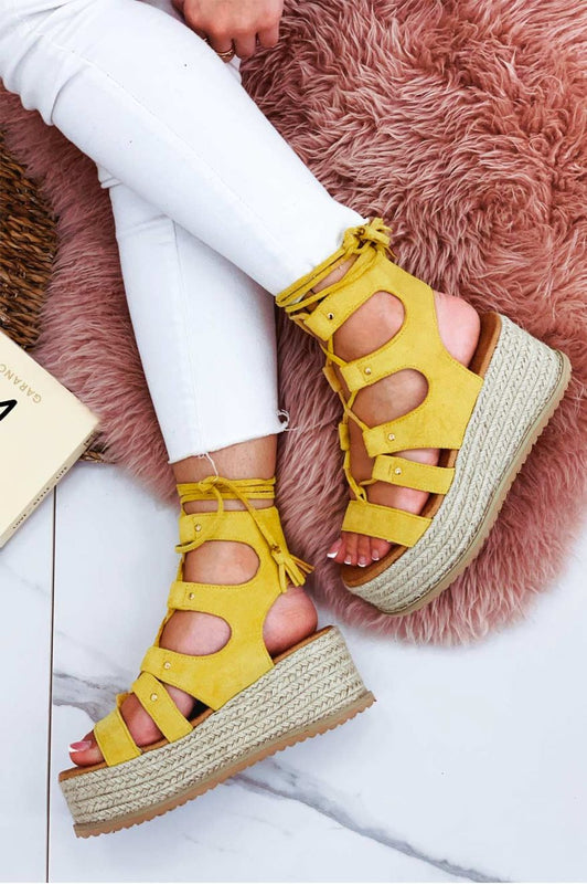 Yellow lace-up sandals with rope wedge