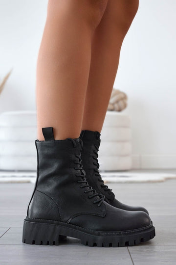 Botines negros tipo militar con cordones